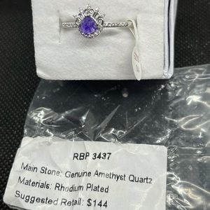 Genuine amethyst quartz on rhodium plated band